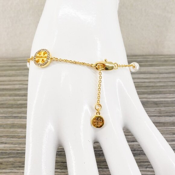 Tory Burch Crystal Logo & Imitation Pearl Station Bracelet Ivory/Tory Gold OS - Picture 12 of 16